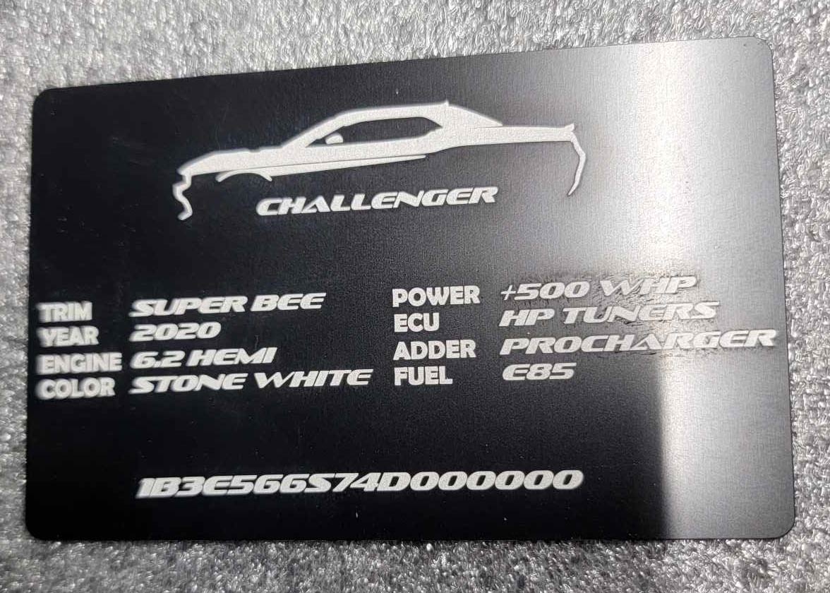Black anodized aluminum Dodge Challenger build plate with engraved specs