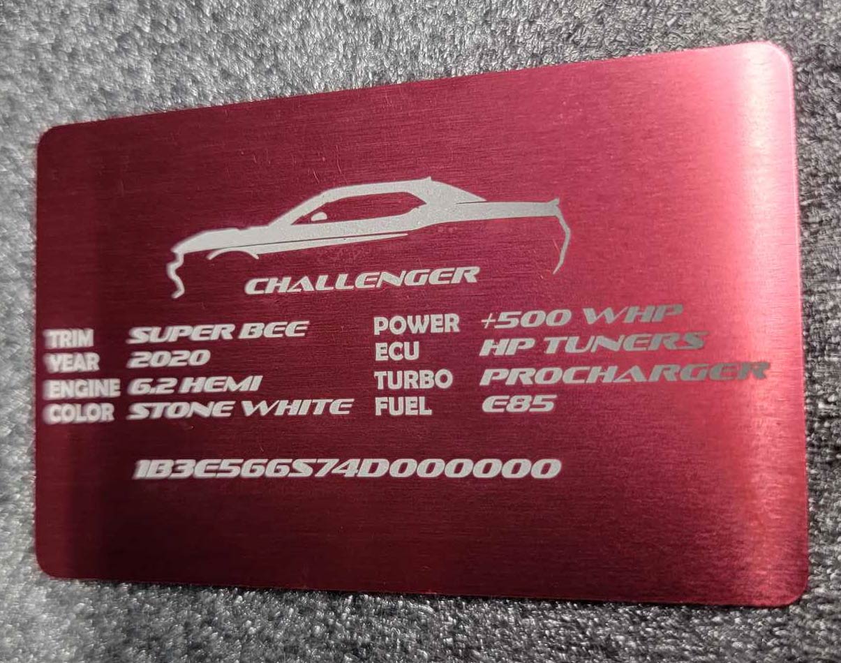 Red anodized aluminum Dodge Challenger build plate with engraved specs