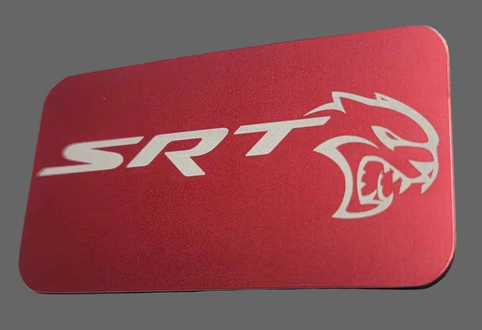 Laser‑engraved red anodized Hellcat supercharger lid badge